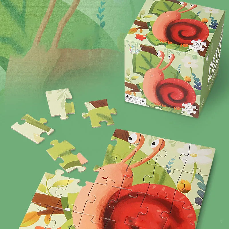 Snail jigsaw puzzle partly assembled with loose pieces and a matching box