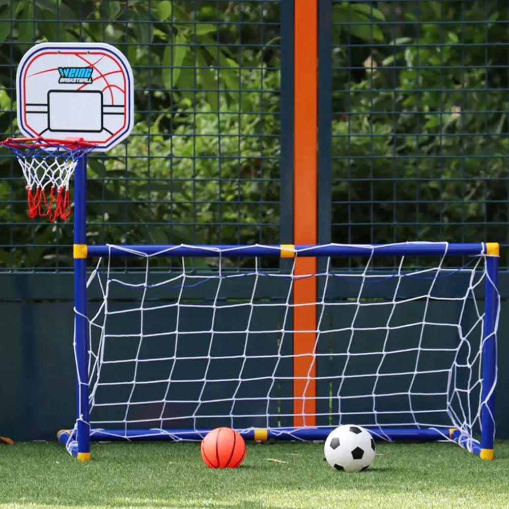 Front view of the soccer goal and basketball hoop with a soccer ball and basketball on grass