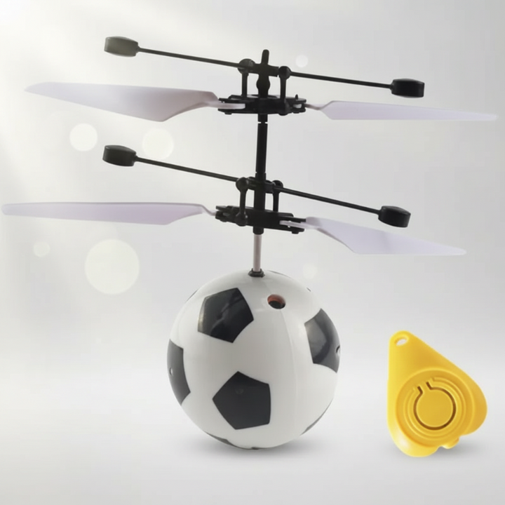 Black-and-white soccer-pattern flying ball with a yellow remote