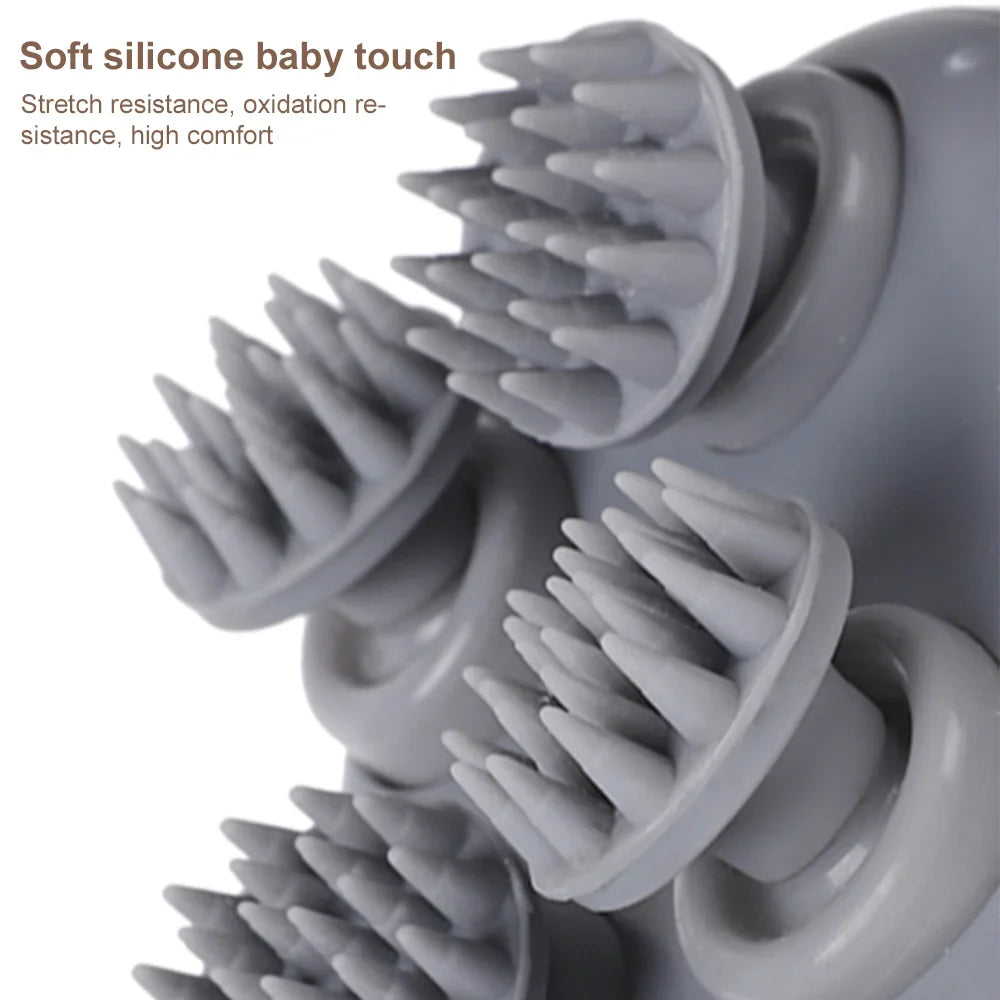 Close-up of four gray silicone massage heads with textured tips.