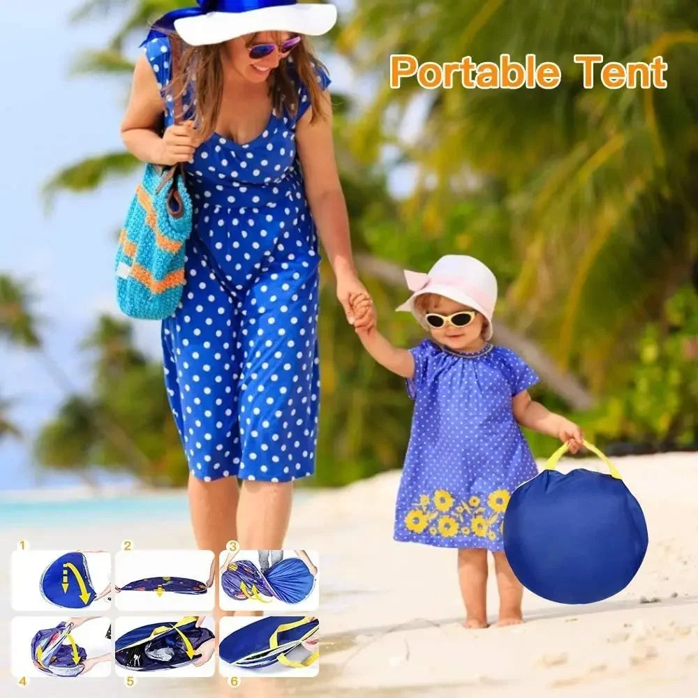 Adult and child outdoors with a round blue tent carrying bag and folding steps shown below.