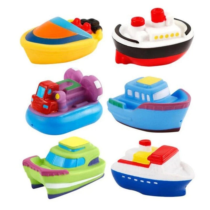 Six colorful soft vinyl bath toy boats in assorted designs