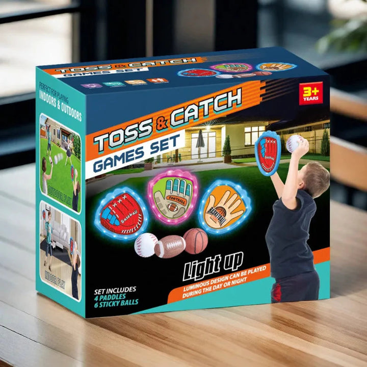 Toss-and-catch game packaging showing sports-themed paddles and balls
