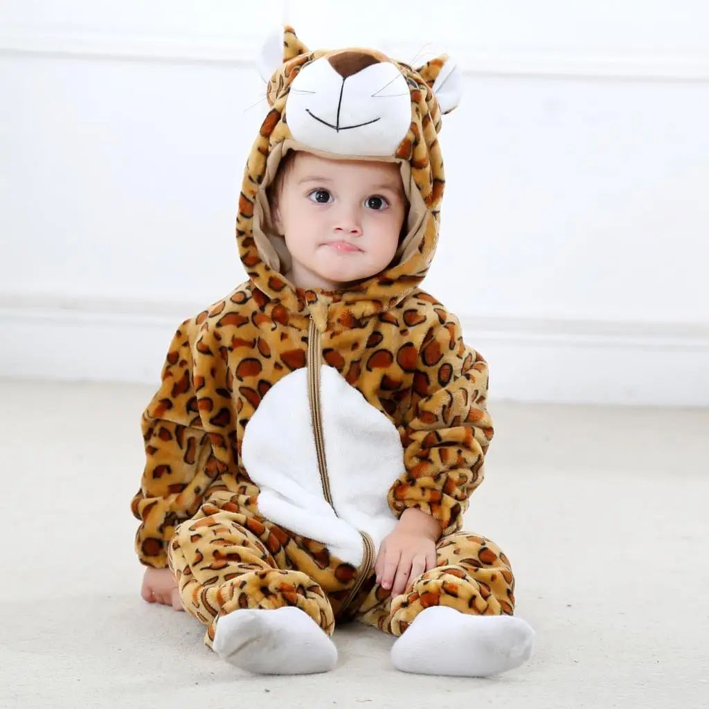 Baby in a spotted leopard onesie with a white belly and animal-face hood