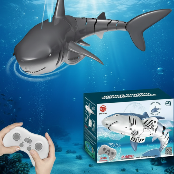 Gray spouting RC shark displayed with its white controller and box