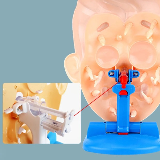 Rear view of the game face with a close-up of its spray mechanism