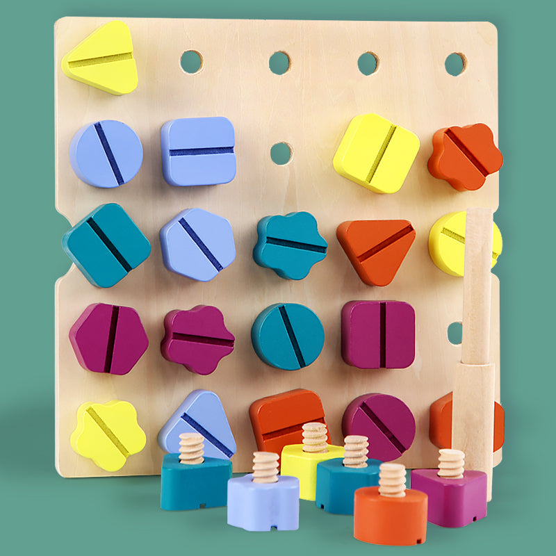 Wooden board with assorted colored shape screws, a screwdriver, and loose pieces alongside