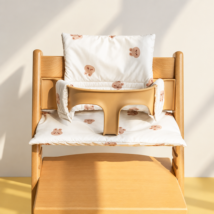 Squirrel-print cushion on a wooden high chair, with padded seat and backrest