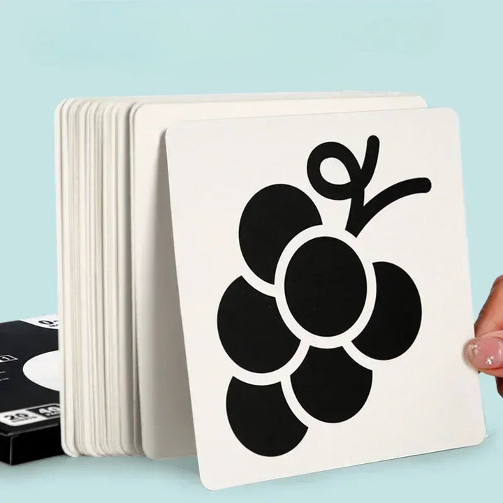 Stack of black-and-white picture cards with a grape design on the front card