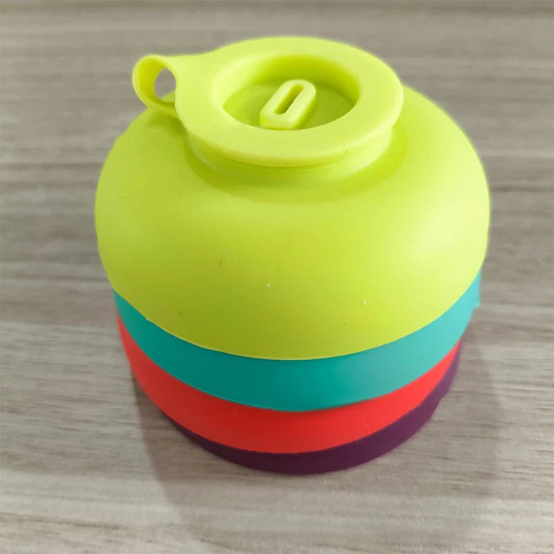 Yellow, blue, red, and purple silicone ice cream holders stacked together