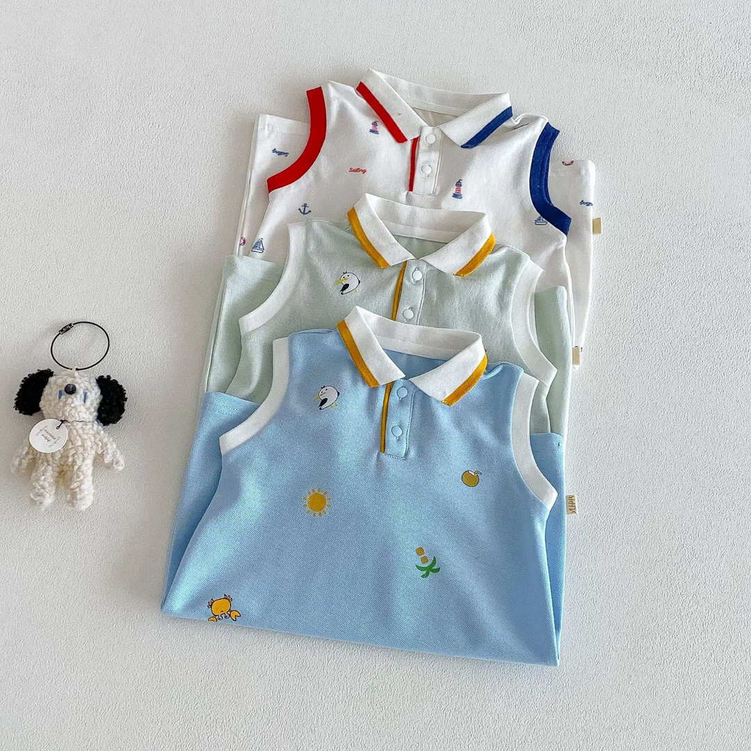 Folded baby polo rompers stacked with light blue in front, light green in the middle, and white behind