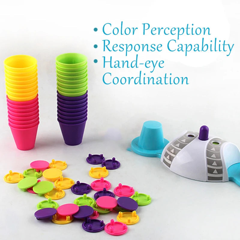 Four colors of stacking cups, color-matching pieces, and the central game base
