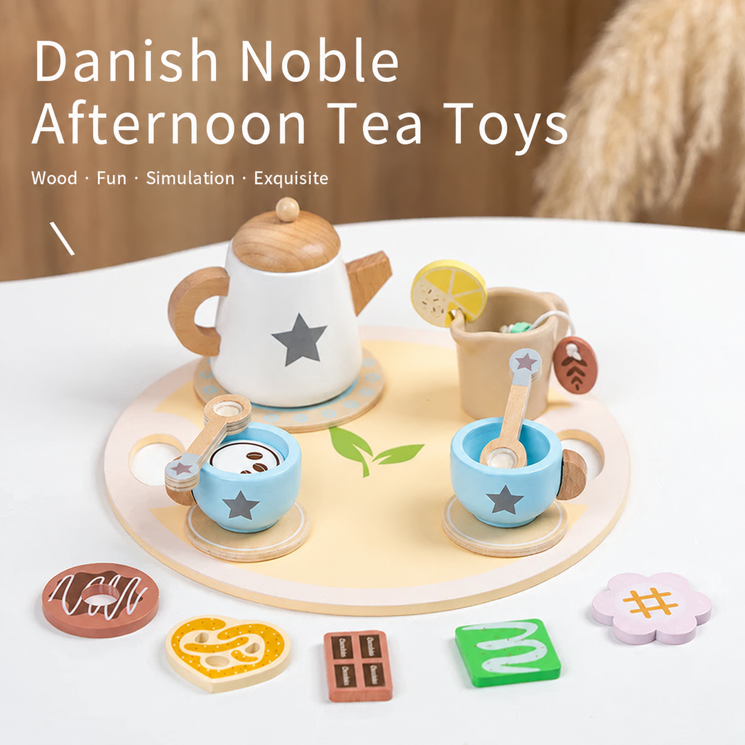 Star-pattern wooden tea set with blue cups, a small pitcher, and pretend cookies around the tray