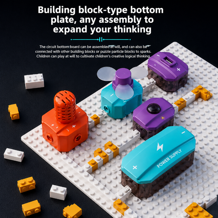 Electronic modules mounted on a studded baseplate beside loose building blocks