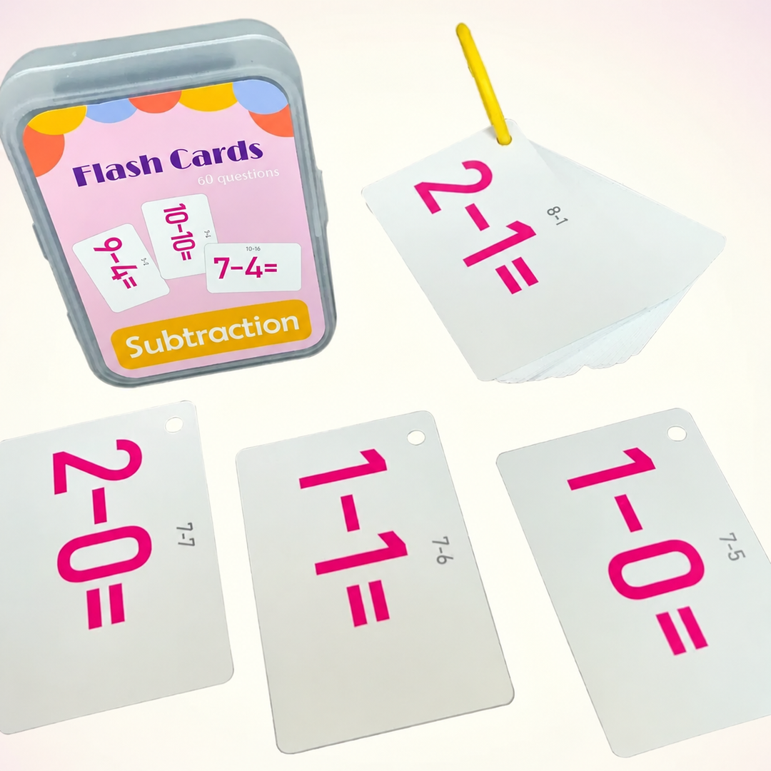 Subtraction flash cards with pink equations, a yellow ring, and storage case.