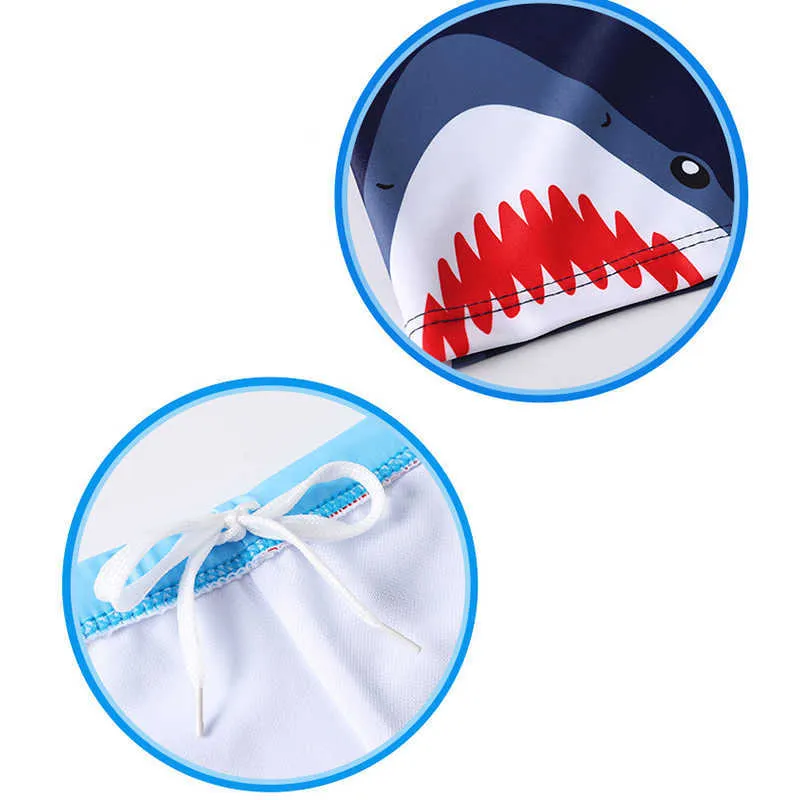 Swim shorts detail graphic showing a shark print and an interior drawstring.