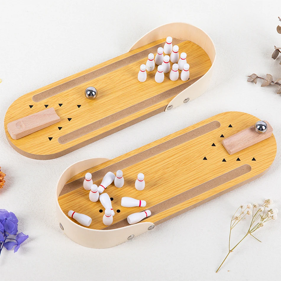 Two views of the tabletop bowling lane with pins standing and knocked over