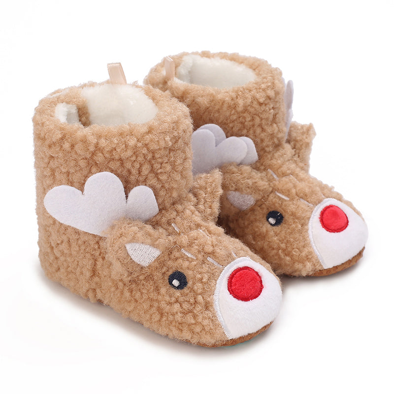 Tan textured baby booties with reindeer faces, white antlers and red noses