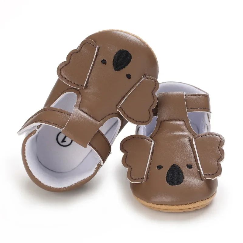 Taupe koala-face baby shoes with rounded ears and front straps