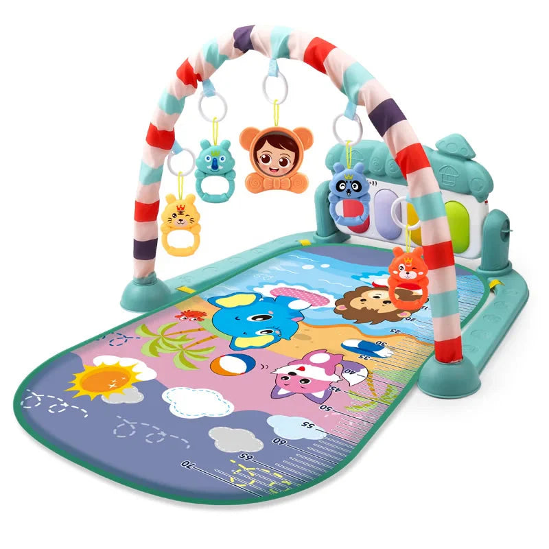 Teal baby play gym with a printed animal mat, hanging toys, and piano panel