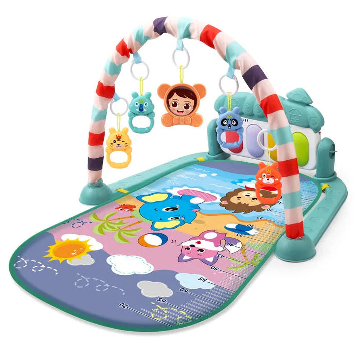 Teal baby play gym with a printed animal mat, hanging toys, and piano panel