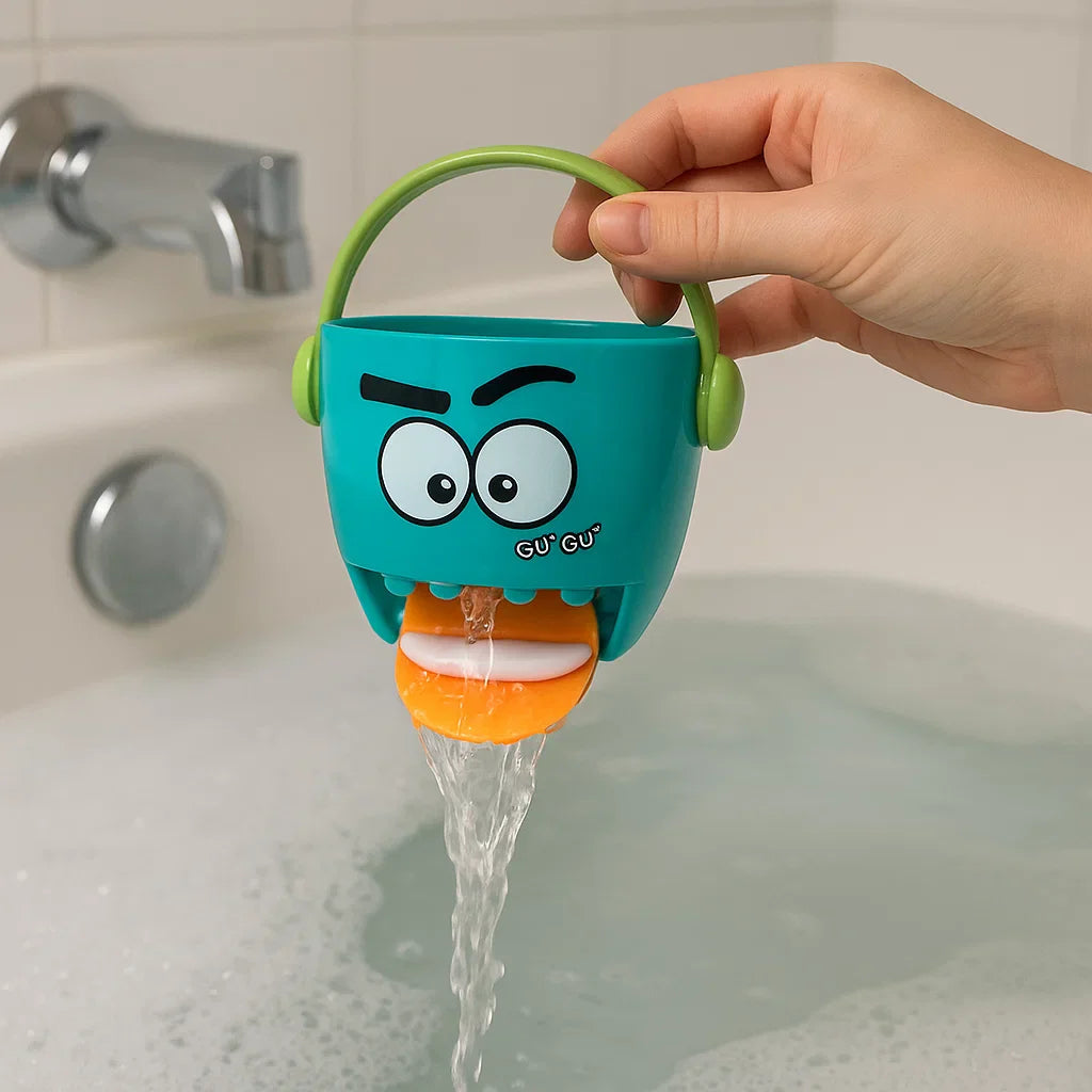 Water draining from the mouth-shaped opening of a teal bath bucket held over a bathtub.