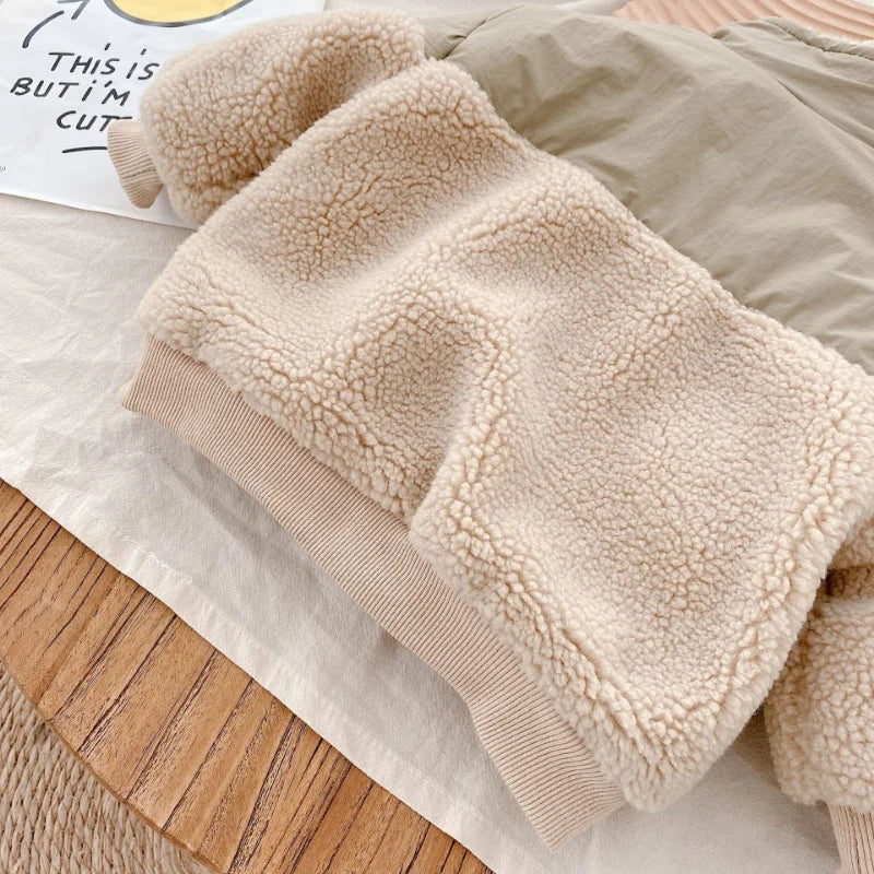 Close-up of beige fleece across the jacket&