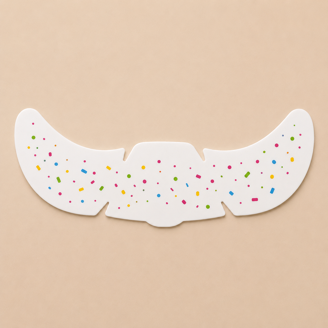 Temporary face sticker sheet with small scattered confetti-like marks