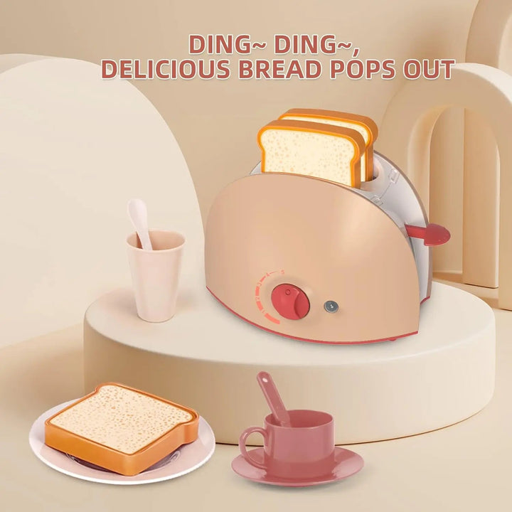 Beige toy toaster with play bread, a side lever, a front dial, and a cup and saucer.