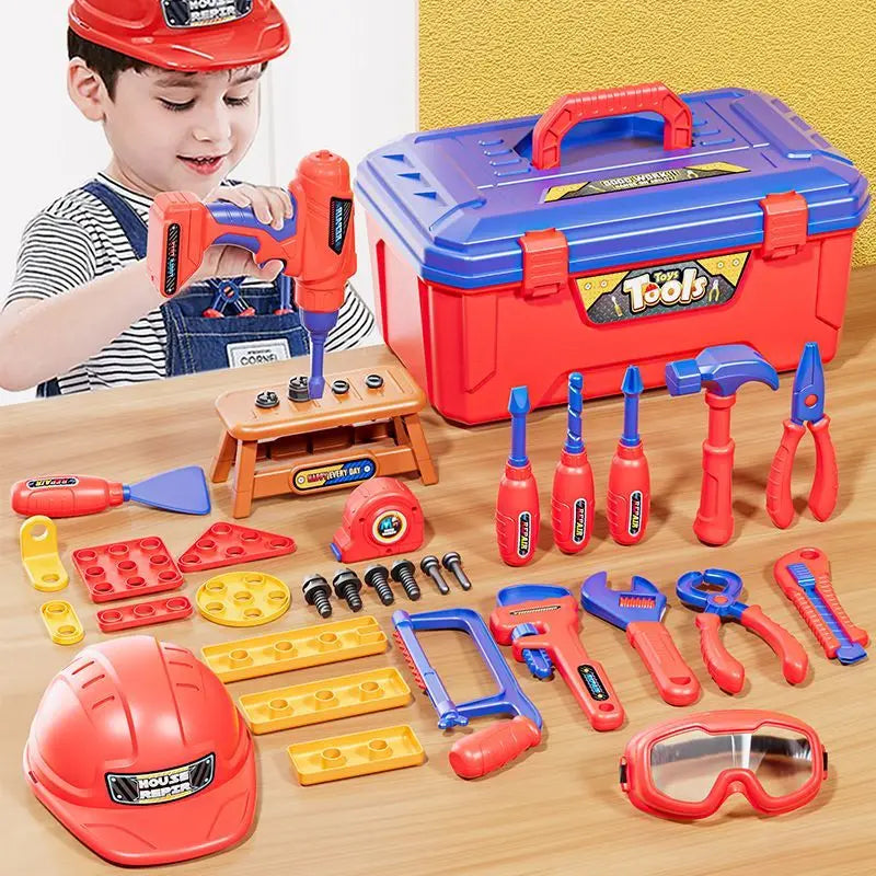 Child using a toy drill at a mini workbench beside a red toolbox and pretend tools