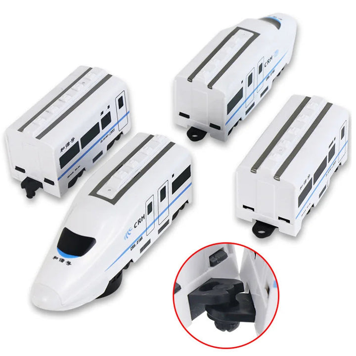 Separated toy train sections with a close-up of the connecting coupler