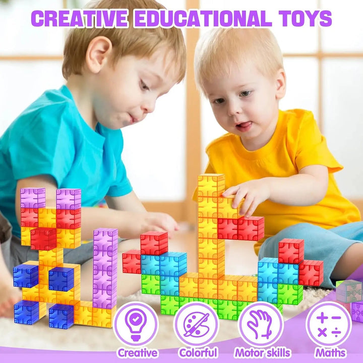 Two children building colorful structures with transparent magnetic cubes.