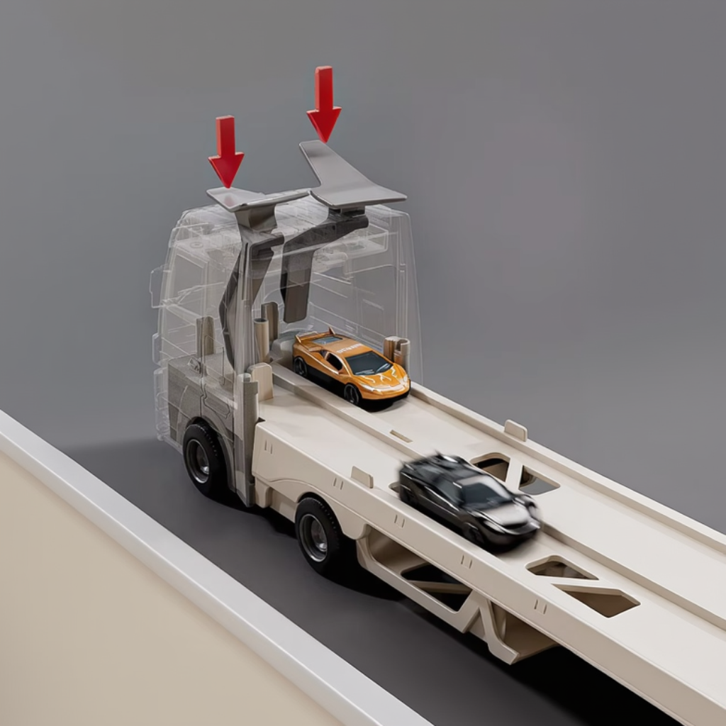 Close-up of the transporter cab with race cars on the lower track and arrows above the top controls