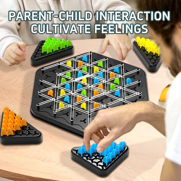 Adult and child playing a triangle strategy game with colored pieces arranged around the board