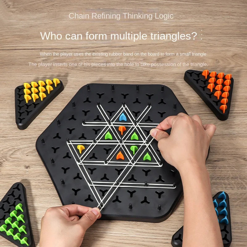 Hands positioning rubber bands to form triangles on a black strategy game board