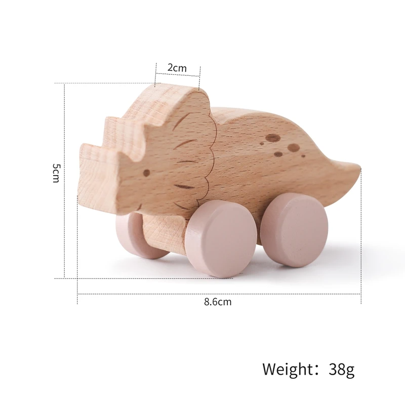 Triceratops wooden toy car with pink wheels and a measurement diagram