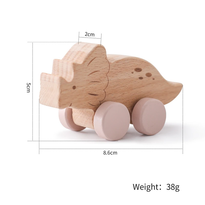 Triceratops wooden toy car with pink wheels and a measurement diagram