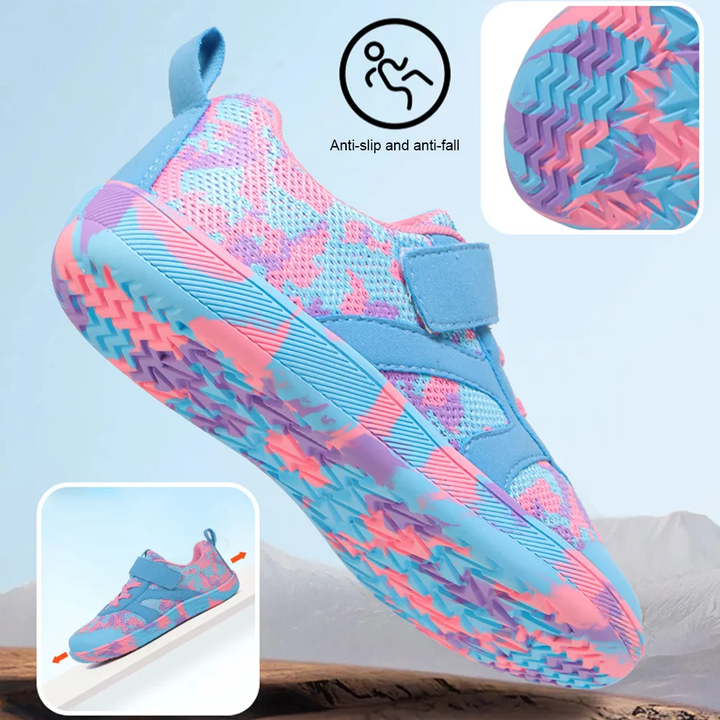 Turquoise and pink sneaker with a close-up of its zigzag sole tread
