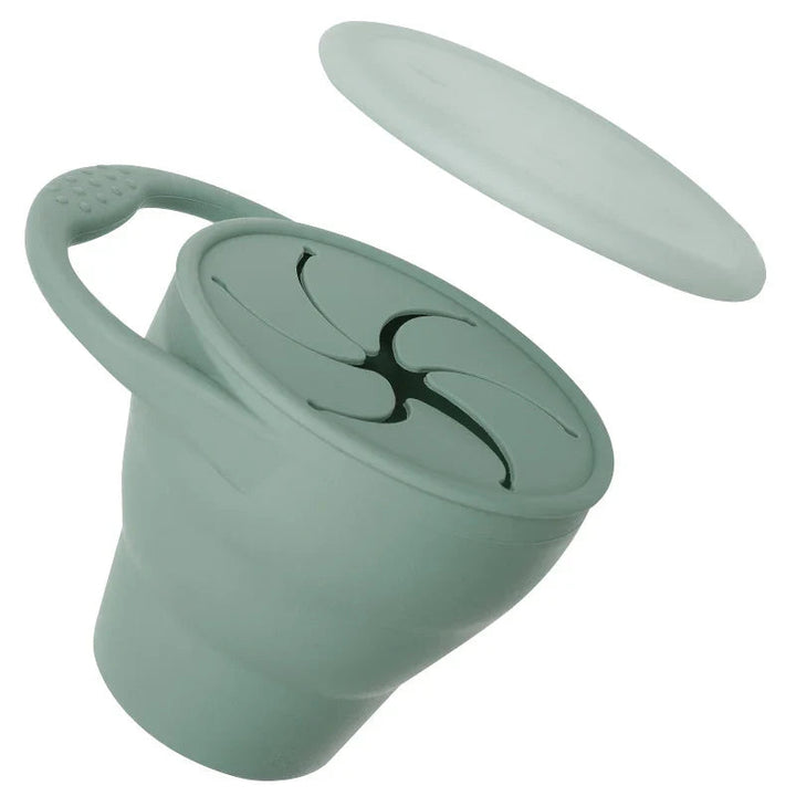 Turquoise silicone snack cup with a carry handle and separate cover