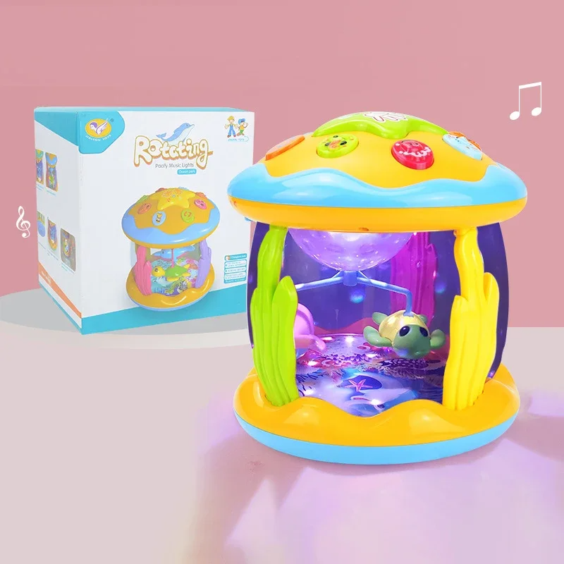 Turtle aquarium projector toy with a purple underwater scene beside its retail box