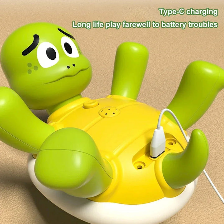 USB-C cable connected to the charging port on the turtle bath toy.