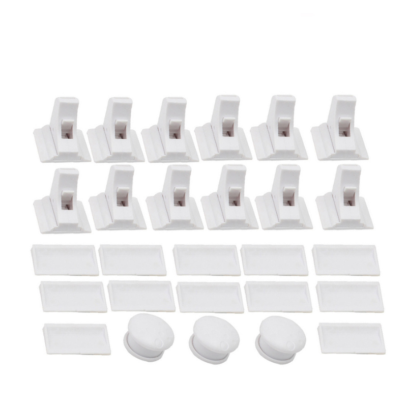 Twelve white cabinet locks with matching mounting plates and three magnetic keys