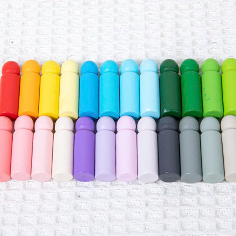 Colored wooden pegs arranged in two rows of warm, cool, and pastel shades