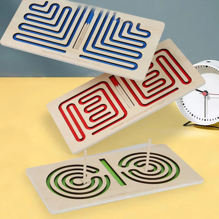 Blue, red, and green wooden maze boards with paired tracing tracks and wooden styluses