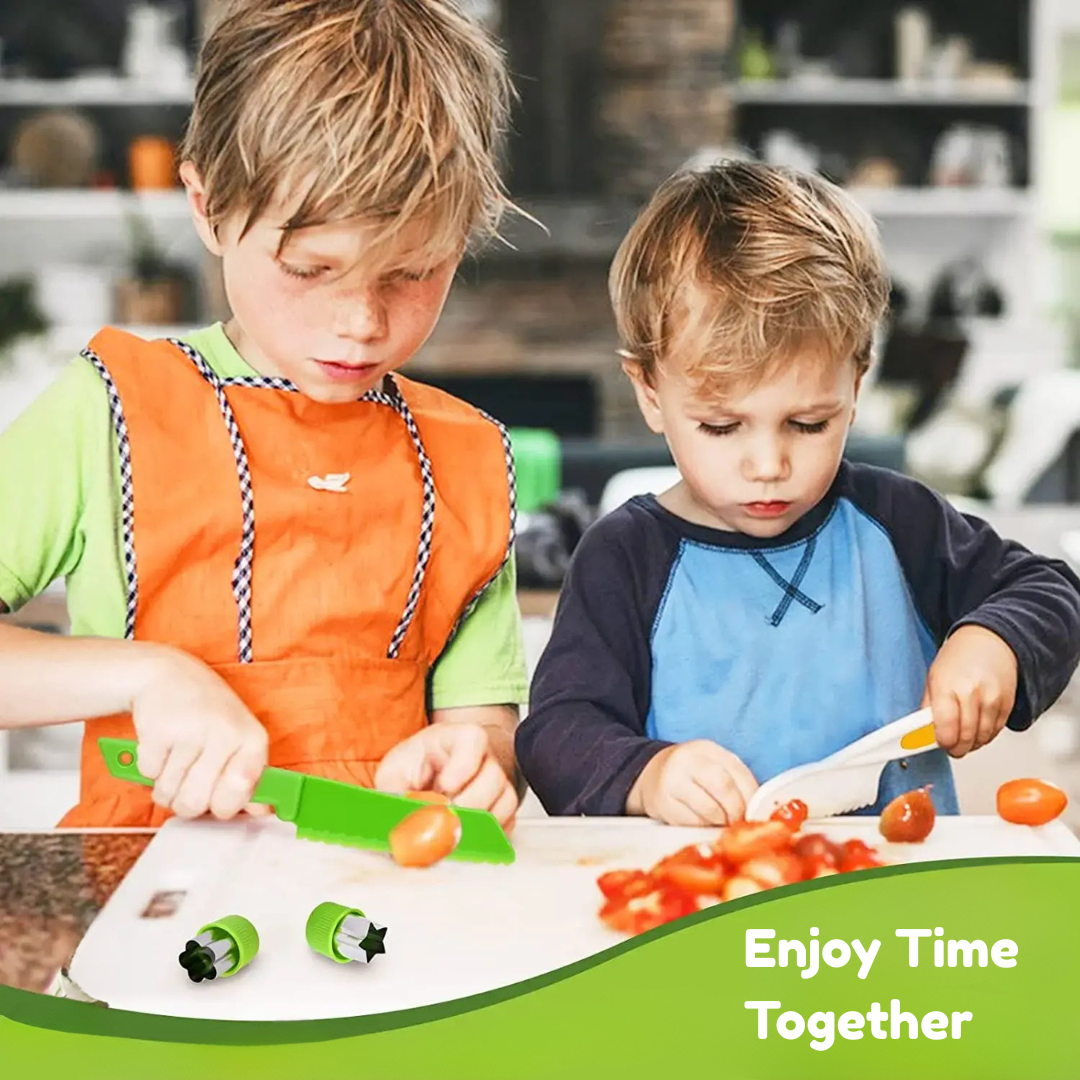 Two children cutting vegetables with green and white kitchen knives