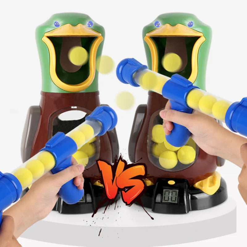 Two duck targets shown side by side with toy rifles and yellow balls