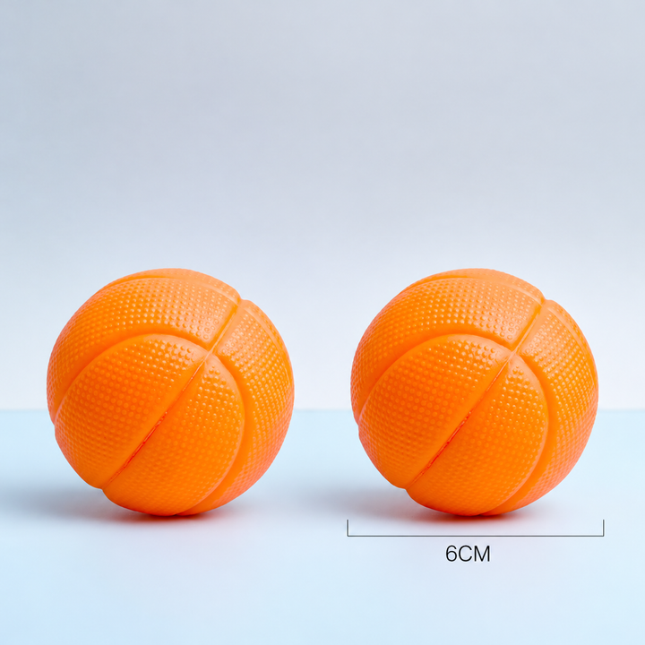 Two textured orange mini basketballs with a 6 cm size marking