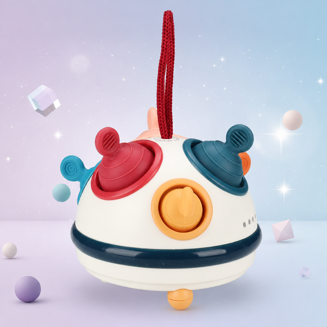 UFO activity toy with colorful controls and a red carrying loop