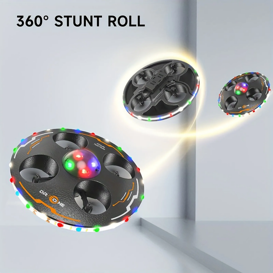 Black LED UFO drone demonstrating a 360-degree stunt roll