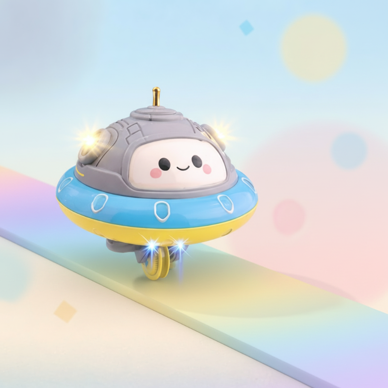 UFO balance toy shown upright on a narrow pastel-colored strip.
